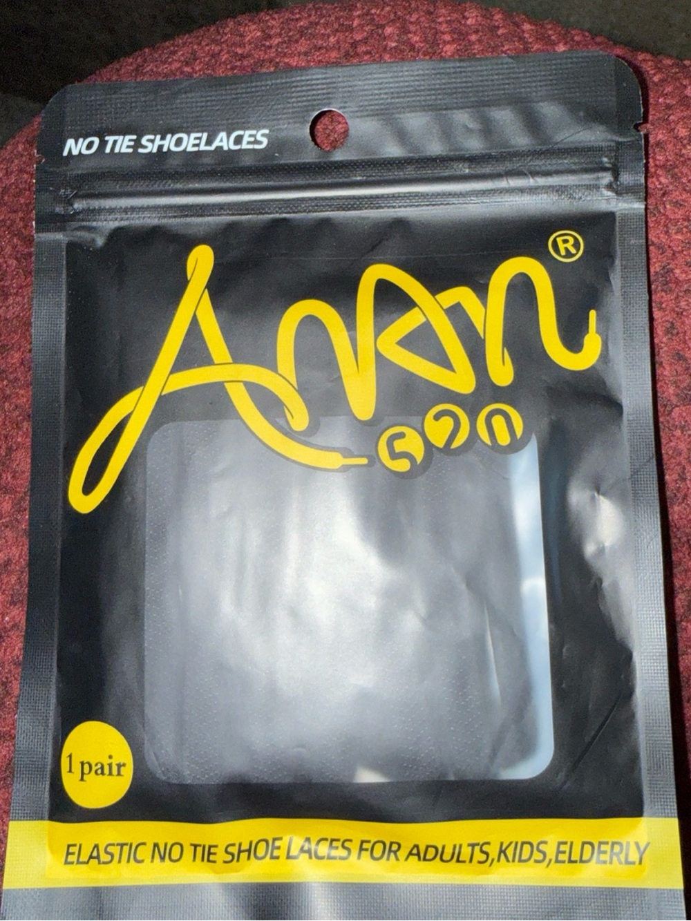 Amanda & Chelsea Black and Yellow Elastic No-Tie Shoelaces Packaging